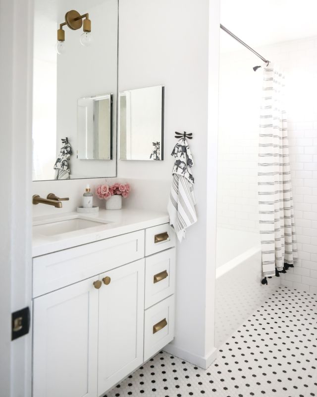 Happy Monday, my friends!​​​​​​​​
​​​​​​​​
An oldie, but goodie - A Contemporary California Farmhouse Chic Kid's Bath with a touch of modern whimsy.  Our mission on this modern farmhouse design project was to create a bright whimsical shared bathroom space for two vibrant and busy school-aged kids with a touch of creative contemporary nostalgia! Of course, adding more functional storage space is always on the list, and we utilized the general existing plumbing locations for the new fixtures and trim.  Touches of antique brass in a vintage style and whimsical touches throughout this space give it the personality and charm that brings this space to life! 

Scroll though to see some of the sweet and classic details in this beautiful space!!! 
​​​​​​​​
Architectural + Interior Design-Build: @4ptdesignbuild​​​​​​​​
Photography: @ryangarvin